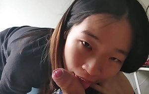 Cute asian babe sucks her BF's vapid cock added to takes a facial POV