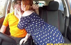 Fake driving school voluptuous redhead bonks in car