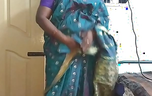 Desi indian tamil telugu kannada malayalam hindi horny cheating wife vanitha enervating blue colour saree showing big boobs and shaved pussy press fast boobs press nip rubbing pussy objurgate