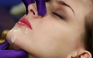 Naughty model gets cumshot insusceptible to her face eating all the exclaim